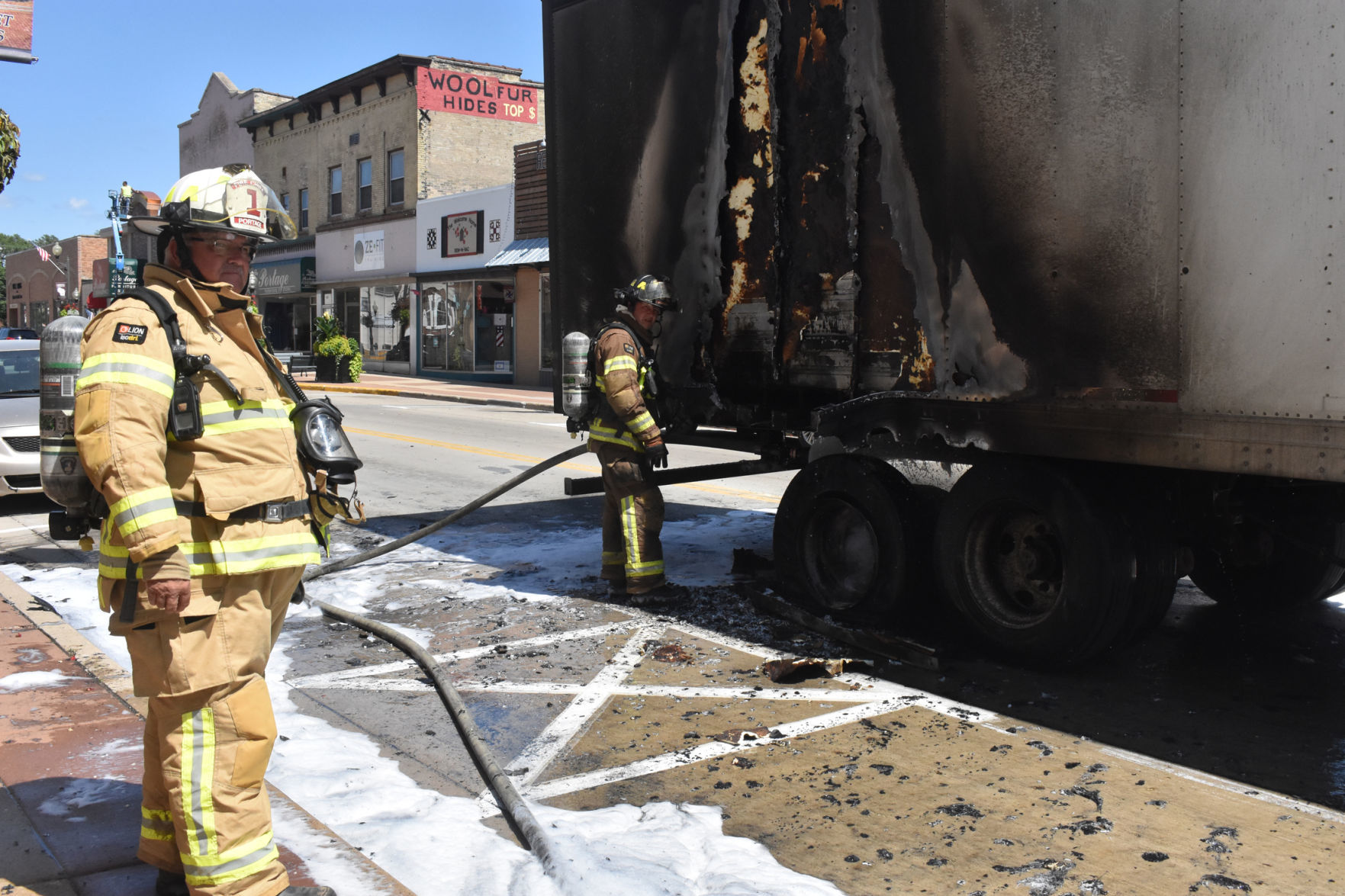 Chief Simonson surveys fire scene